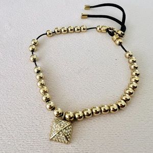 Michael Kors fashion bracelet.